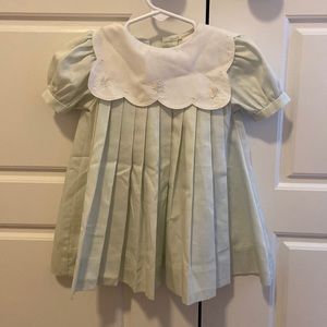 Very sweet green dress. Perfect for events this time of year.